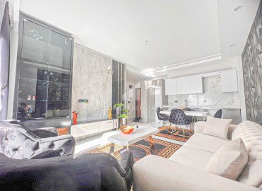 Новая квартира с одной спальней, 50м², в комфортабельном комплексе, в 550м от моря в районе Тосмур, Алания ID-15895 фото-5
