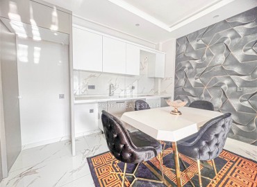 Новая квартира с одной спальней, 50м², в комфортабельном комплексе, в 550м от моря в районе Тосмур, Алания ID-15895 фото-6