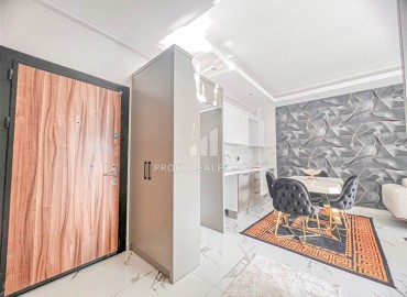 Новая квартира с одной спальней, 50м², в комфортабельном комплексе, в 550м от моря в районе Тосмур, Алания ID-15895 фото-7
