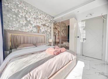 Новая квартира с одной спальней, 50м², в комфортабельном комплексе, в 550м от моря в районе Тосмур, Алания ID-15895 фото-9