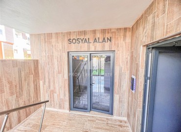 Новая квартира с одной спальней, 50м², в комфортабельном комплексе, в 550м от моря в районе Тосмур, Алания ID-15895 фото-17