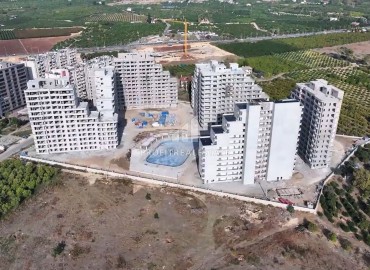 Двухкомнатные апартаменты, 70м², в строящемся масштабном элитном комплексе в районе Томюк, Эрдемли ID-15904 фото-15