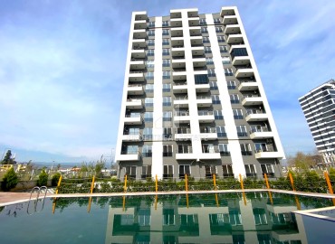 Апартаменты 1+1, 55м², с чистовой отделкой в комплексе премиум класса в 500м от моря в Эрдемли, Арпачбахшиш ID-15916 фото-15