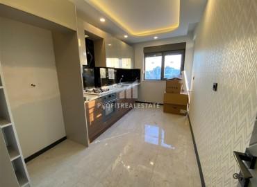 Inexpensive one bedroom apartment in a new building, with a separate kitchen, unfurnished, 55m², Kepez, Antalya ID-15920 фото-6