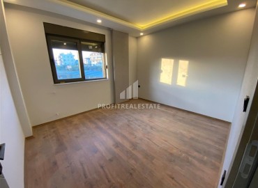 Inexpensive one bedroom apartment in a new building, with a separate kitchen, unfurnished, 55m², Kepez, Antalya ID-15920 фото-12