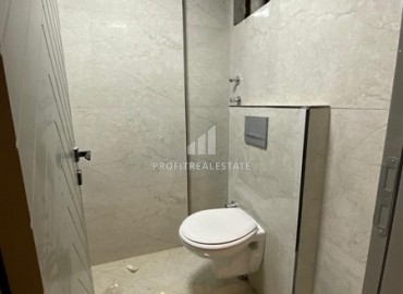 Inexpensive one bedroom apartment in a new building, with a separate kitchen, unfurnished, 55m², Kepez, Antalya ID-15920 фото-14
