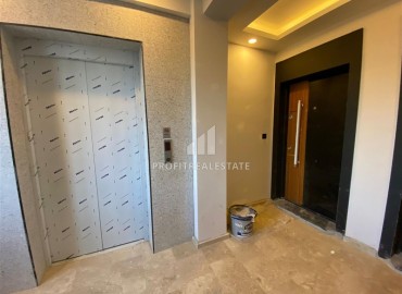 Inexpensive one bedroom apartment in a new building, with a separate kitchen, unfurnished, 55m², Kepez, Antalya ID-15920 фото-15
