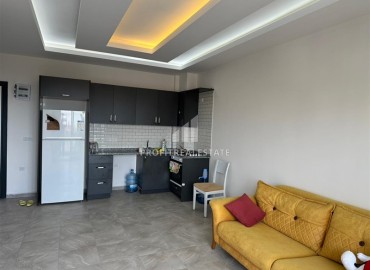 Современные апартаменты с одной спальней, 60м². в новостройке с бассейном, у подножия гор в районе Махмутлар, Алания ID-15925 фото-4