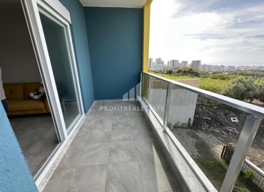 Современные апартаменты с одной спальней, 60м². в новостройке с бассейном, у подножия гор в районе Махмутлар, Алания ID-15925 фото-12