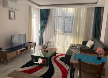 Cozy one bedroom apartment 60m², furnished, 200 meters from the sea, in a residence with a swimming pool, Mahmutlar, Alanya ID-15933 фото-1