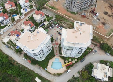 Элегантная меблированная квартира 2+1, 120м², с большим застекленным балконом и видом на море, Махмутлар, Аланья ID-15940 фото-20