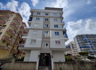 Ready to move in, two bedroom apartment with separate kitchen, 130m², in a residence with a swimming pool in Mahmutlar, Alanya ID-15958 фото-1