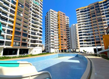 Two bedroom apartment, 130 m², in Arpacbakhsis, Erdemli, in a new premium residence by the sea at a super price ID-15968 фото-1