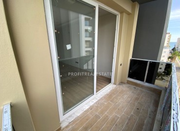 Новая квартира с одной спальней, 55м², в комплексе премиум класса в районе Томюк, Мерсин ID-15969 фото-12