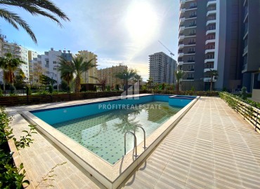 New one bedroom apartment, 55m², in a premium residence in Tomyuk area, Mersin ID-15969 фото-15