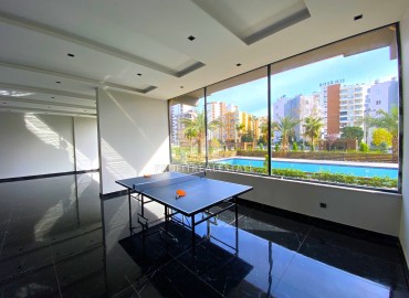 Новая квартира с одной спальней, 55м², в комплексе премиум класса в районе Томюк, Мерсин ID-15969 фото-18