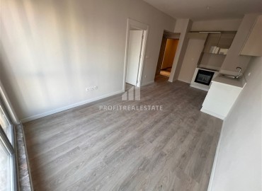 Inexpensive spacious one bedroom apartment 72m², in a new building, unfurnished, overlooking the city and the sea, Kepez, Antalya ID-15974 фото-2