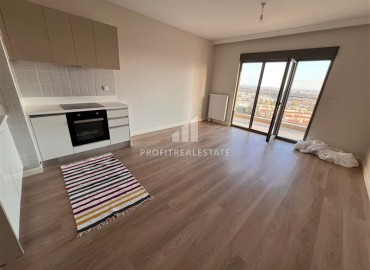 Inexpensive spacious one bedroom apartment 72m², in a new building, unfurnished, overlooking the city and the sea, Kepez, Antalya ID-15974 фото-3