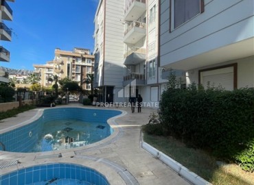 Cozy furnished apartment 1+1, 65m², with gas heating, in a residence with a swimming pool, Khurma, Antalya ID-15975 фото-9