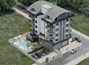Компактная двухкомнатная квартира, 39м² в новом комплексе с инфраструктурой в 450м от моря в Каргыджаке, Алания ID-15989 фото-3