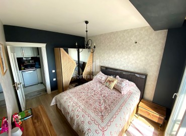 Квартира с одной спальней, 60м², с видом на море в уютном комплексе района Томюк, Мерсин ID-16000 фото-11