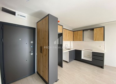 Апартаменты 1+1, 60м², с чистовой отделкой с хорошей инфраструктурой в районе Мерсина Томюк ID-16003 фото-2