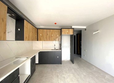 Квартира с одной спальней, 60м², с видом на горы, в комфортабельном комплексе в районе Томюк, Эрдемли ID-16005 фото-7