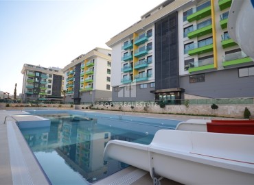 Двухкомнатные апартаменты в новой резиденции отельного типа, в 100 метрах от моря, Каргыджак, Аланья ID-11234 фото-12