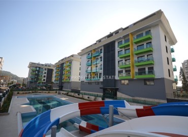Двухкомнатные апартаменты в новой резиденции отельного типа, в 100 метрах от моря, Каргыджак, Аланья ID-11234 фото-13