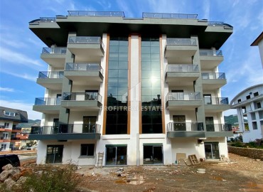 One-bedroom apartment, 60m², in a residence with good facilities under construction in Oba, Alanya ID-16018 фото-1