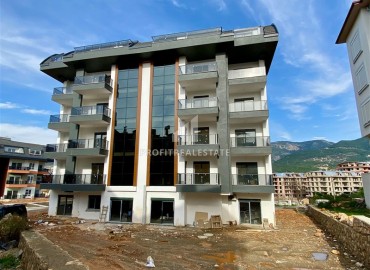 One-bedroom apartment, 60m², in a residence with good facilities under construction in Oba, Alanya ID-16018 фото-16