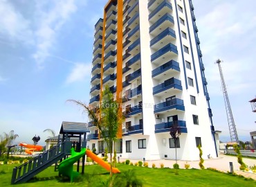 Стильная двухкомнатная квартира, 65м², с видом на море в комфортабельном комплексе в Мерсине, район Каргыпынары ID-14791 фото-1