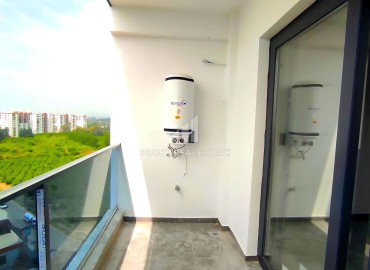 Стильная двухкомнатная квартира, 65м², с видом на море в комфортабельном комплексе в Мерсине, район Каргыпынары ID-14791 фото-9