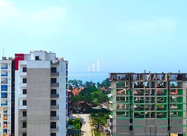 Стильная двухкомнатная квартира, 65м², с видом на море в комфортабельном комплексе в Мерсине, район Каргыпынары ID-14791 фото-11