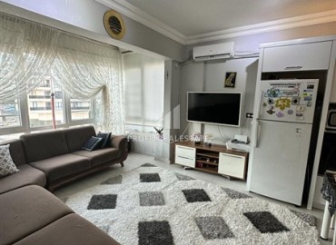 Three bedroom apartment, 110m², in an urban building with parking in the center of Alanya ID-16021 фото-1