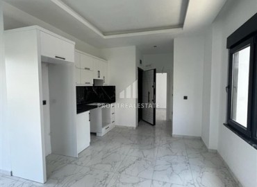 Unfurnished one bedroom apartment, 52m², in a new building with facilities, Oba, Alanya ID-16030 фото-4