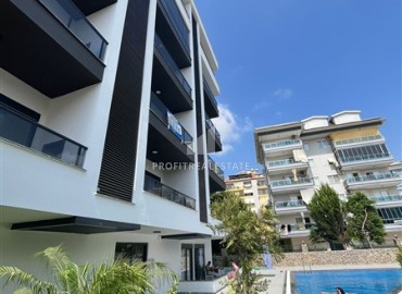 Unfurnished one bedroom apartment, 52m², in a new building with facilities, Oba, Alanya ID-16030 фото-16