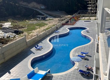 Profitable proposition! Inexpensive stylish apartment with furniture, 1+1, 48m², in a residence with facilities, Avsallar, Alanya ID-16032 фото-14