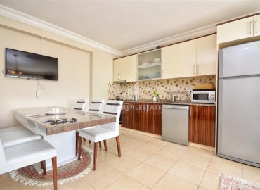 Cozy two-bedroom apartment, 105m², on the central street of Mahmutlar, Alanya, 150m from the sea ID-16038 фото-3