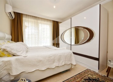 Cozy two-bedroom apartment, 105m², on the central street of Mahmutlar, Alanya, 150m from the sea ID-16038 фото-7