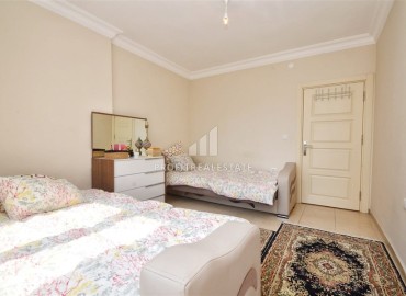 Cozy two-bedroom apartment, 105m², on the central street of Mahmutlar, Alanya, 150m from the sea ID-16038 фото-10