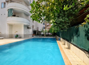 Cozy two-bedroom apartment, 105m², on the central street of Mahmutlar, Alanya, 150m from the sea ID-16038 фото-15