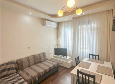 Inexpensive furnished one bedroom apartment 55m², in an urban house, 300 meters from the sea, Mahmutlar, Alanya ID-16045 фото-2
