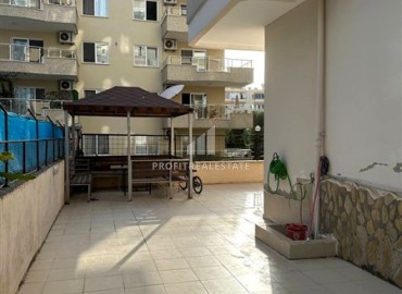 Inexpensive furnished one bedroom apartment 55m², in an urban house, 300 meters from the sea, Mahmutlar, Alanya ID-16045 фото-15