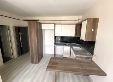 Двухкомнатные апартаменты, 55м², в новом комфортабельном комплексе в районе Енишехир, Чифтликкёй ID-16063 фото-2