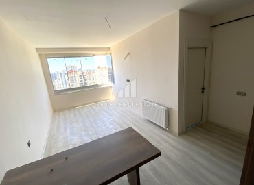 Двухкомнатные апартаменты, 55м², в новом комфортабельном комплексе в районе Енишехир, Чифтликкёй ID-16063 фото-3
