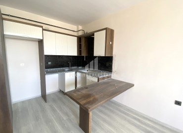 One bedroom apartment, 55 m², in a new comfortable residence in Yenisehir, Ciftlikkoy ID-16063 фото-5