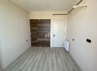 Двухкомнатные апартаменты, 55м², в новом комфортабельном комплексе в районе Енишехир, Чифтликкёй ID-16063 фото-11