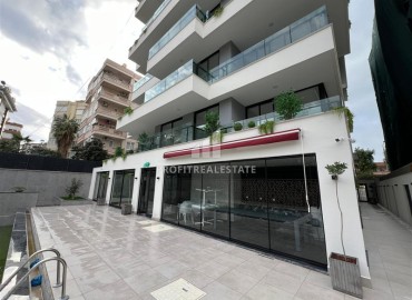 One-bedroom apartment 60 m2 under construction, 150 meters from the sea, in the center of Alanya ID-12846 фото-2
