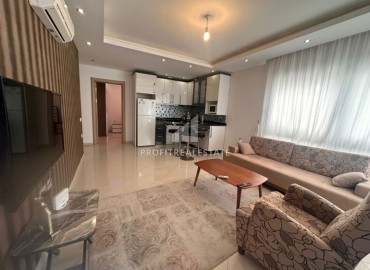 Furnished apartment 1+1, 55m², in the center of Alanya in a modern house with a swimming pool, 350m from the sea ID-16070 фото-3